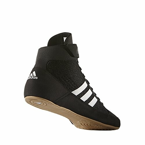 Black Adidas wrestling shoe with white stripes and gum sole