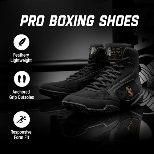 Black pro boxing shoes with features: lightweight, grip outsoles, form fit.