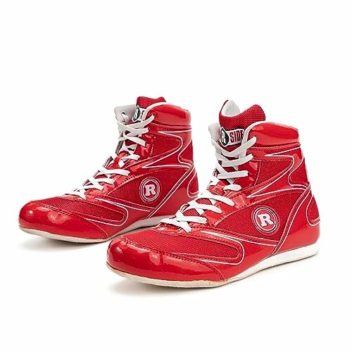 Red high-top sneakers with laces and logo