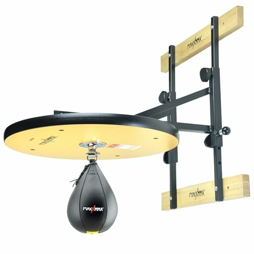 Wall-mounted speed bag platform with black speed bag.