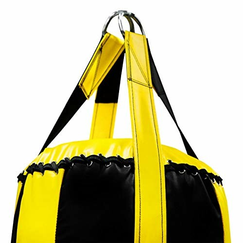 Top view of a yellow and black punching bag with straps.